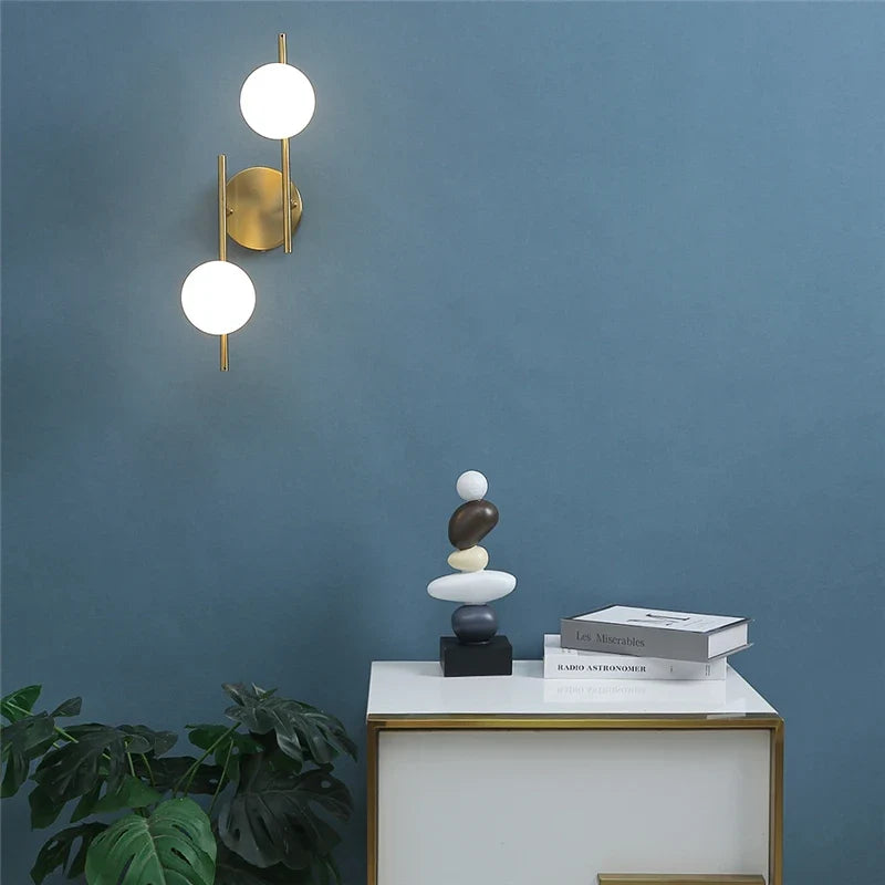 Goldara Wall Light | Modern Gold Globe Design In Single or Double Globe Configuration Options