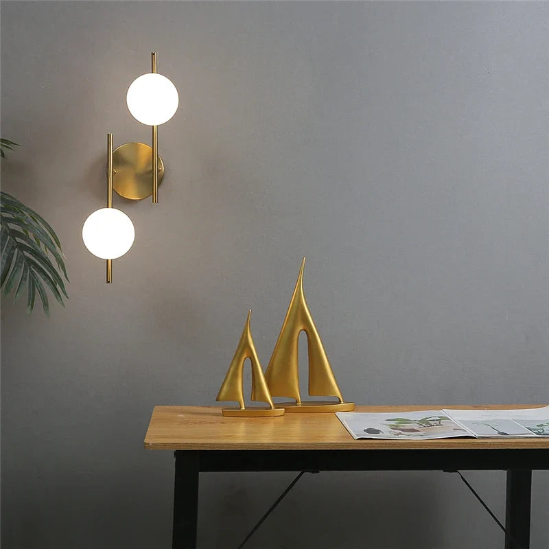 Goldara Wall Light | Modern Gold Globe Design In Single or Double Globe Configuration Options