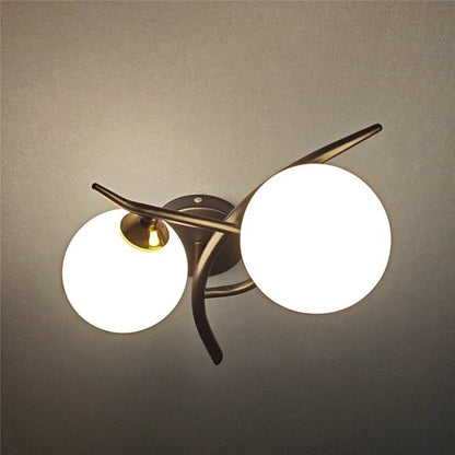 Duolume Wall Light | Nordic Dual Globe LED Design In Gold or Black, In Left or Right Handed Form