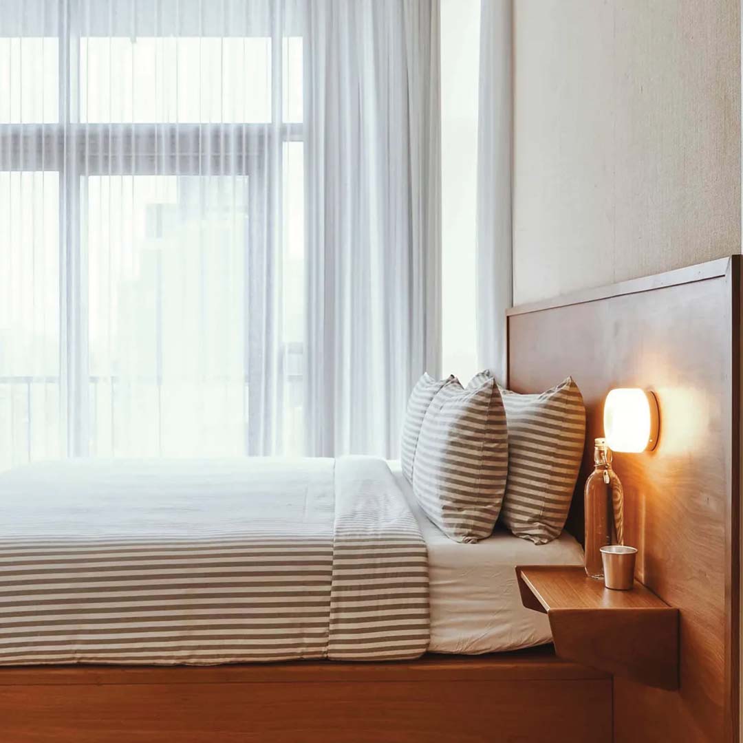 Aurelva Wall Lamp | Modern LED Sconce In An Amber, Smoke Grey or White Glass Colourway Finish