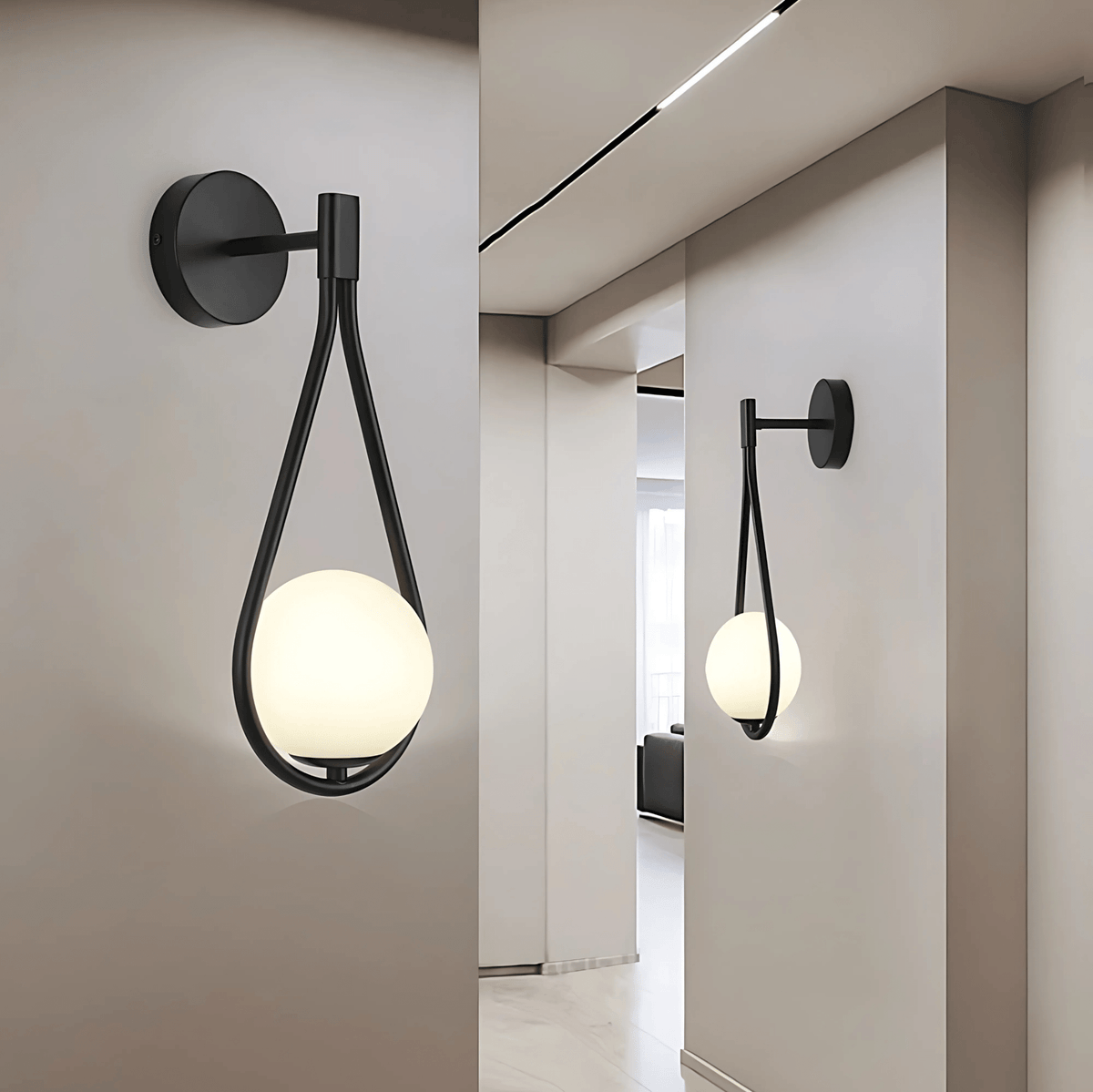 Droplet Wall Light | Modern Teardrop Wall Lamp In A Brushed Brass or Satin Black Metal Finish
