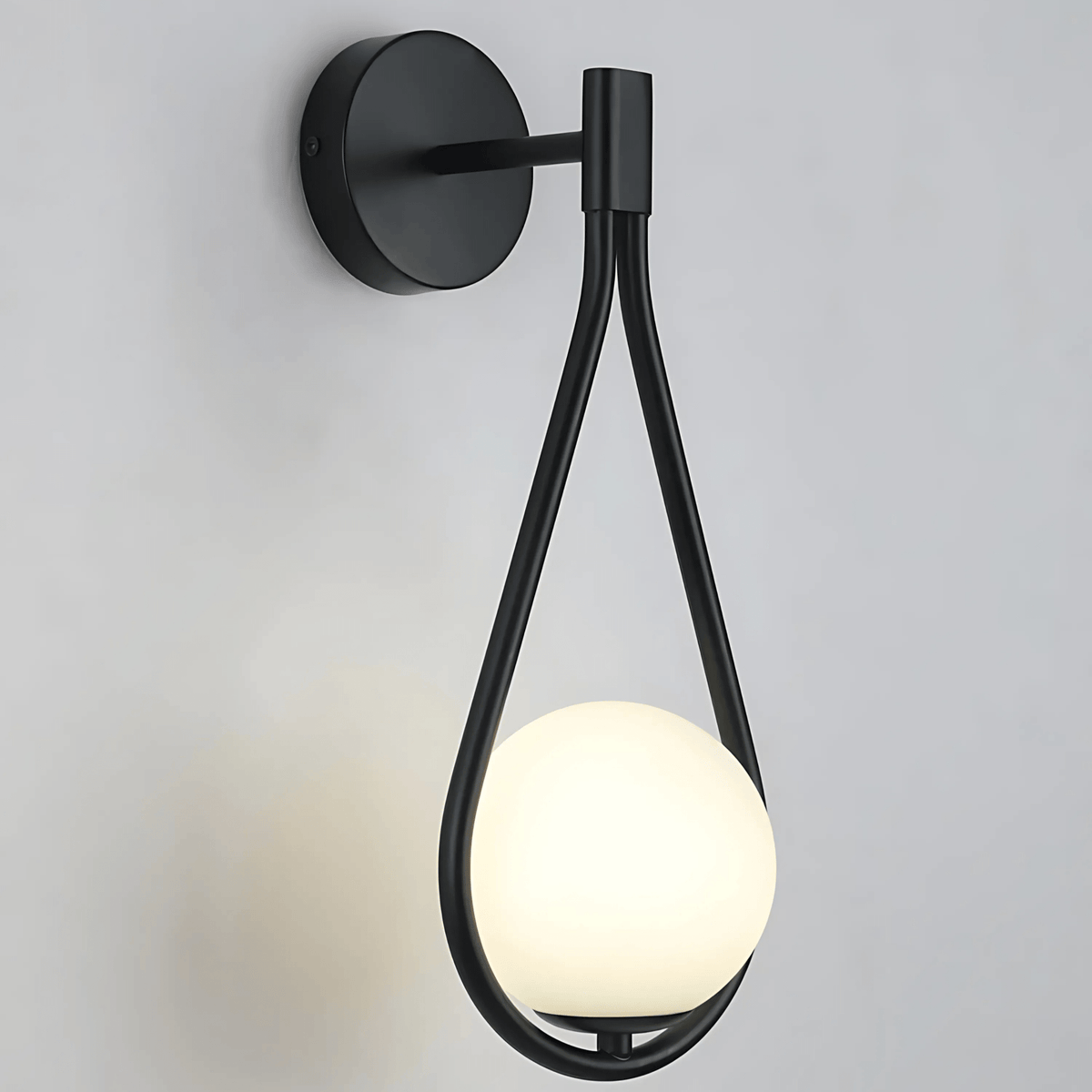 Droplet Wall Light | Modern Teardrop Wall Lamp In A Brushed Brass or Satin Black Metal Finish