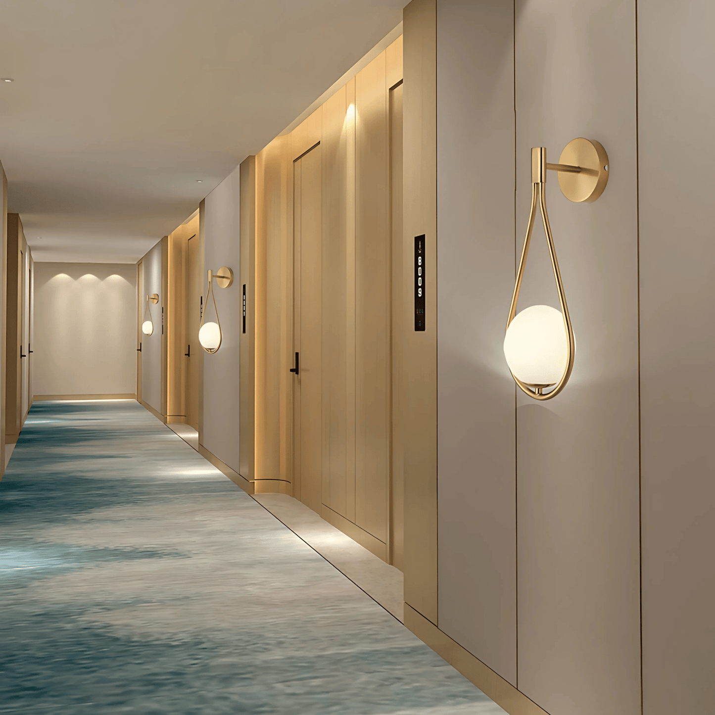 Droplet Wall Light | Modern Teardrop Wall Lamp In A Brushed Brass or Satin Black Metal Finish