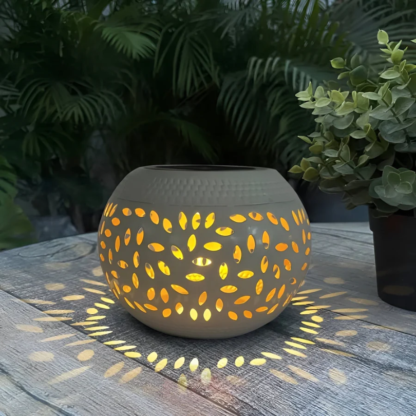 Lumbra Solar Garden Light | Decorative Cut Metal Lamp Casting Patterns Across Paths and Beds